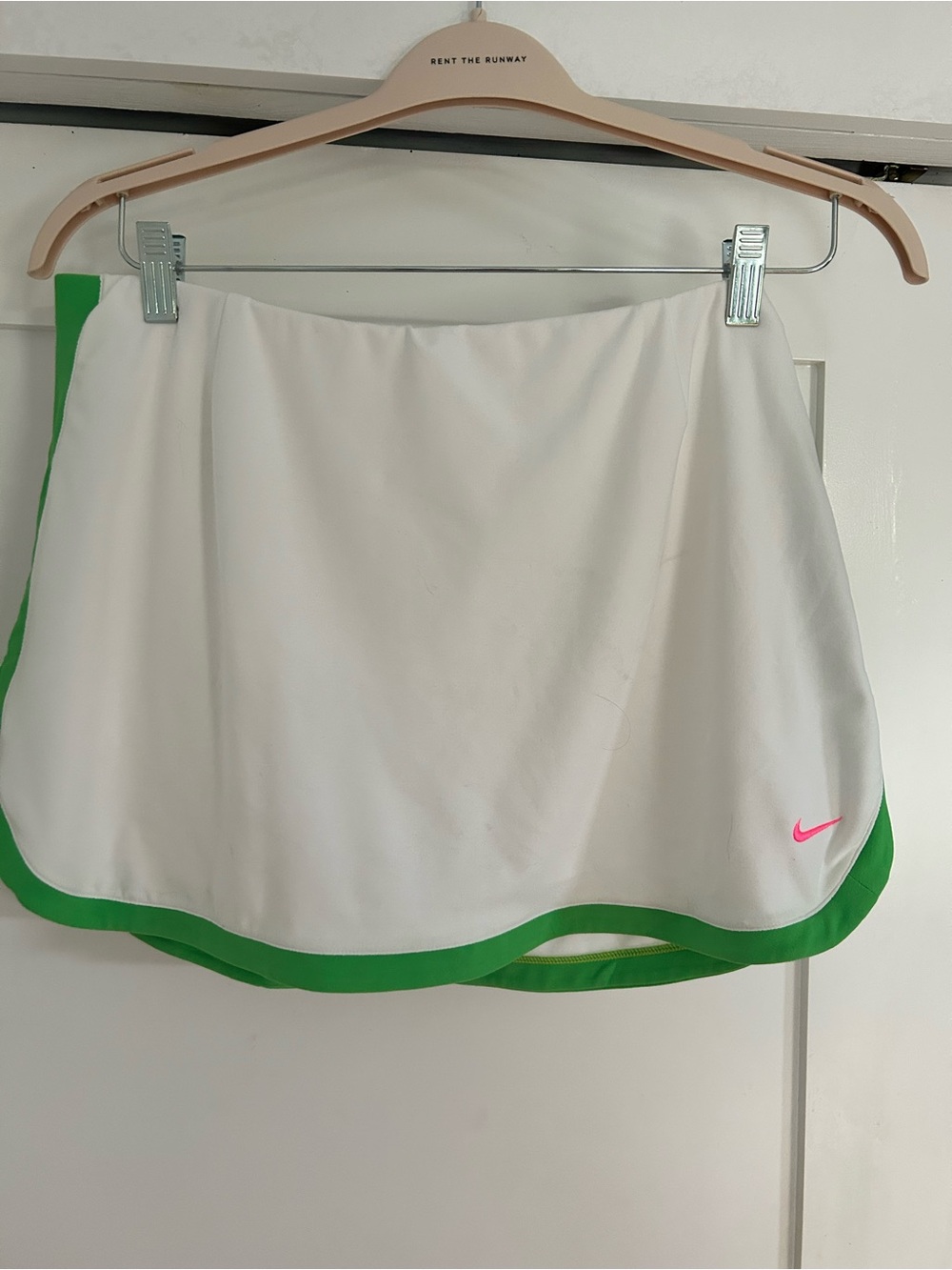 Nike White Tennis Skirt with Green Trim and Pink Swoosh Accent